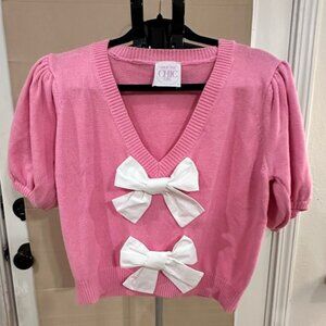 Pink Sweater with White Bows